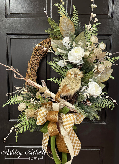 **Warm Owl in Winters Snow Wreath**