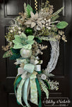 Elegance of Emerald in Snow Oval Wreath