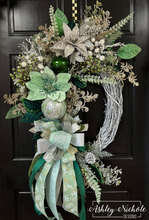 Elegance of Emerald in Snow Oval Wreath